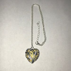 Silver glow in the dark heart charm necklace